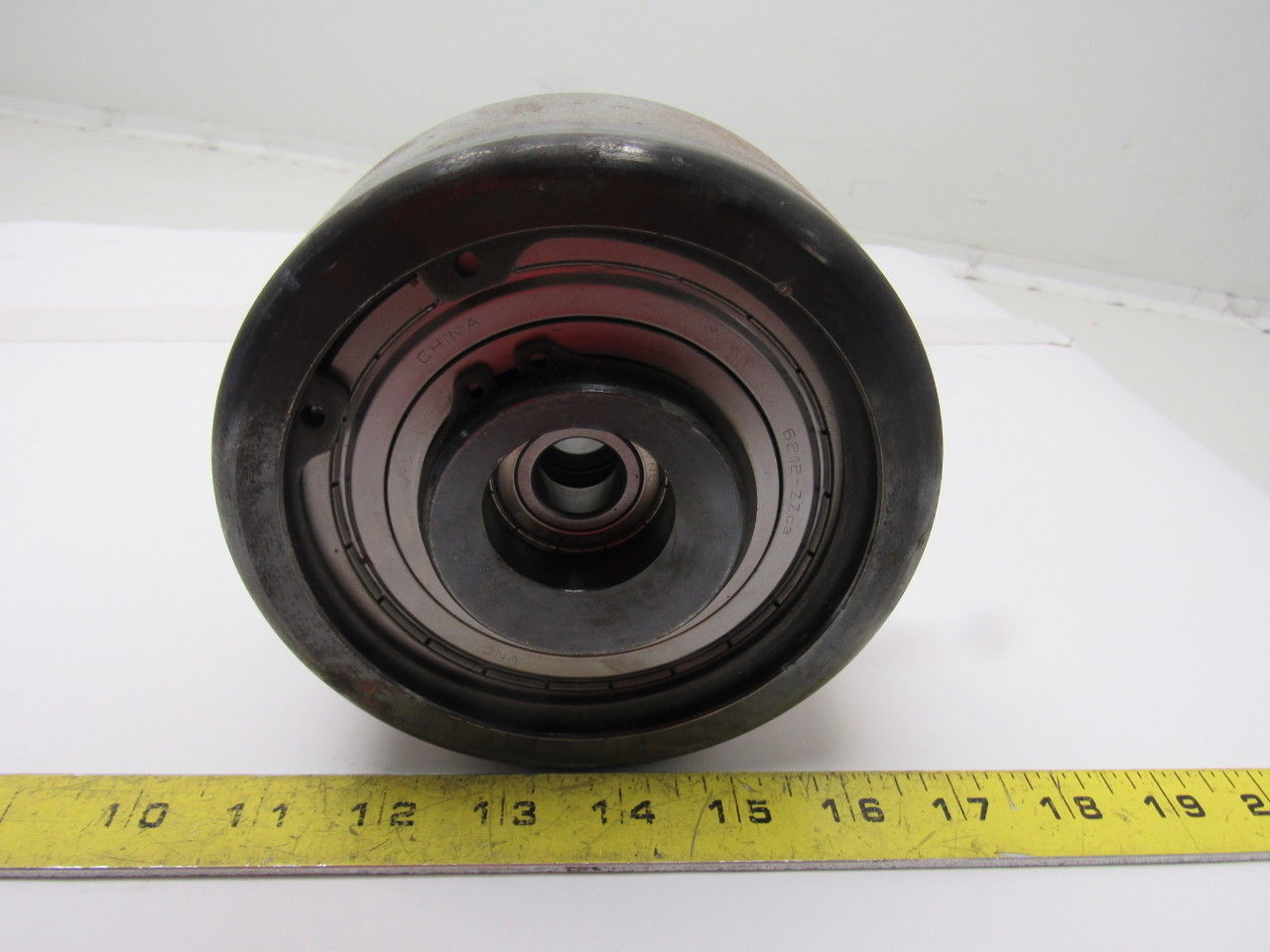 Dematic 5-1/2" x 2-1/4" Crowned Face End Pully W/ Cam  Attachment 5/8" Bore