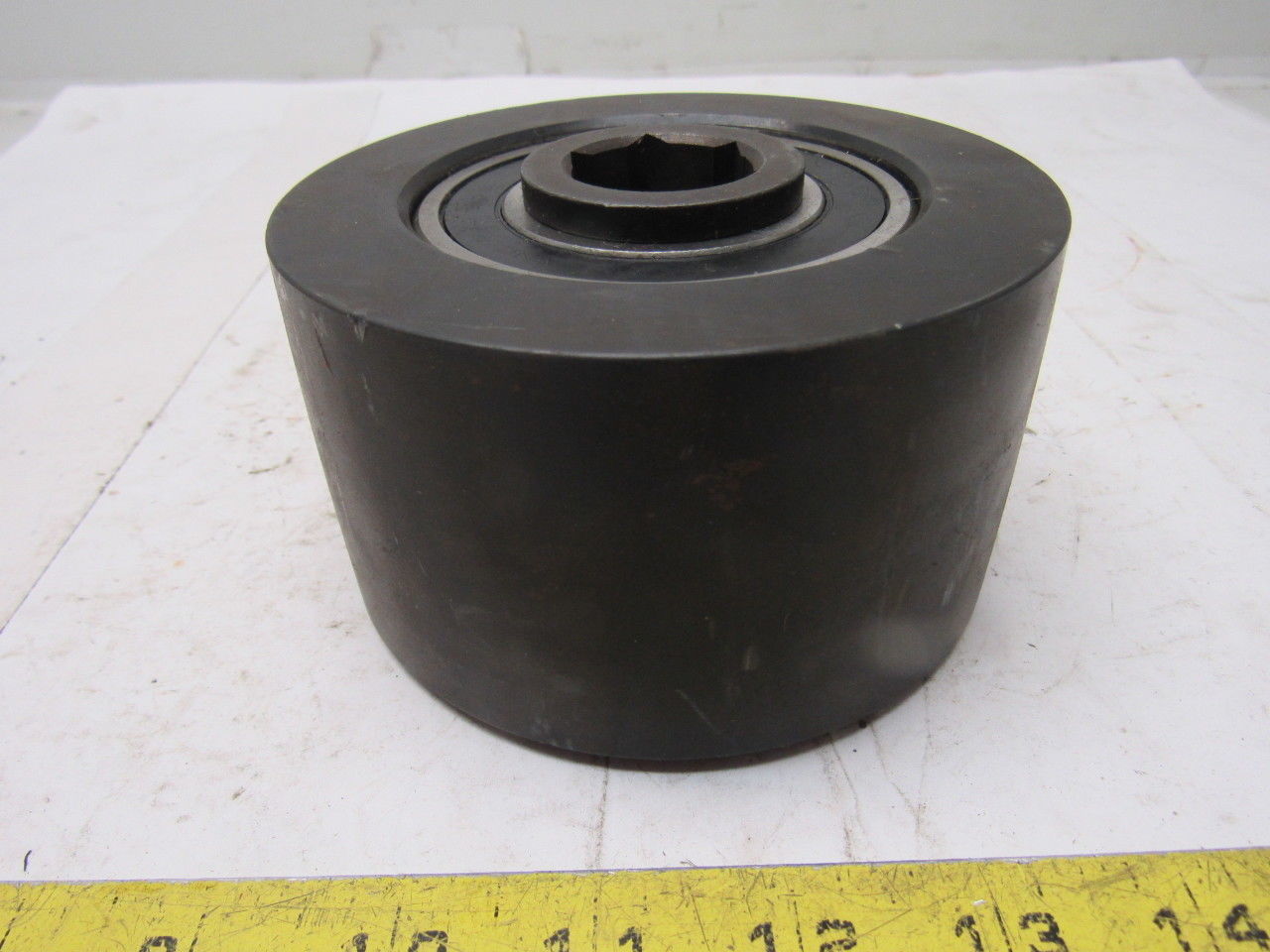Dematic 4-13/16" OD x 2-5/8" Crowned Face End Roller 1-1/16" Hex Bore