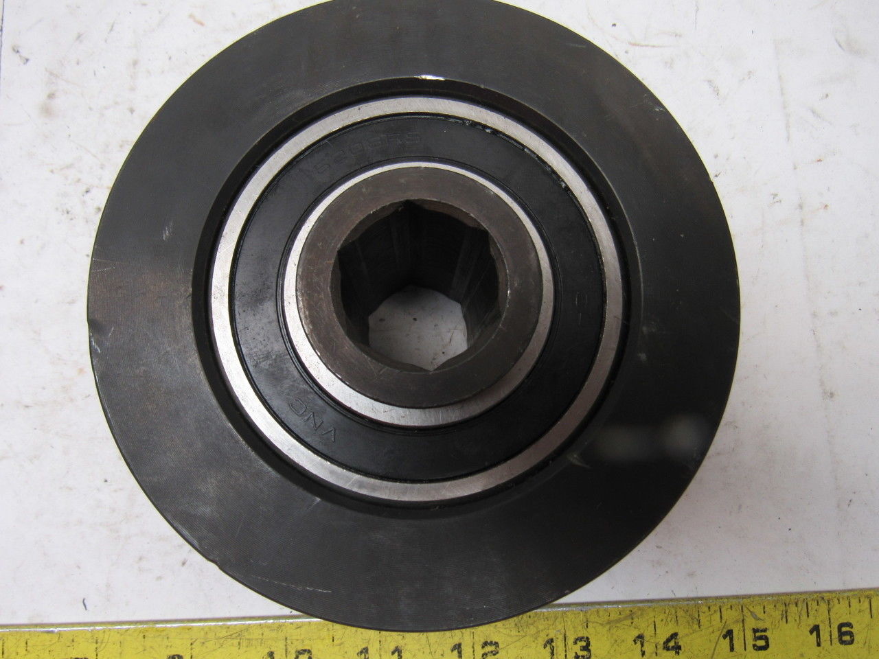 Dematic 4-13/16" OD x 2-5/8" Crowned Face End Roller 1-1/16" Hex Bore