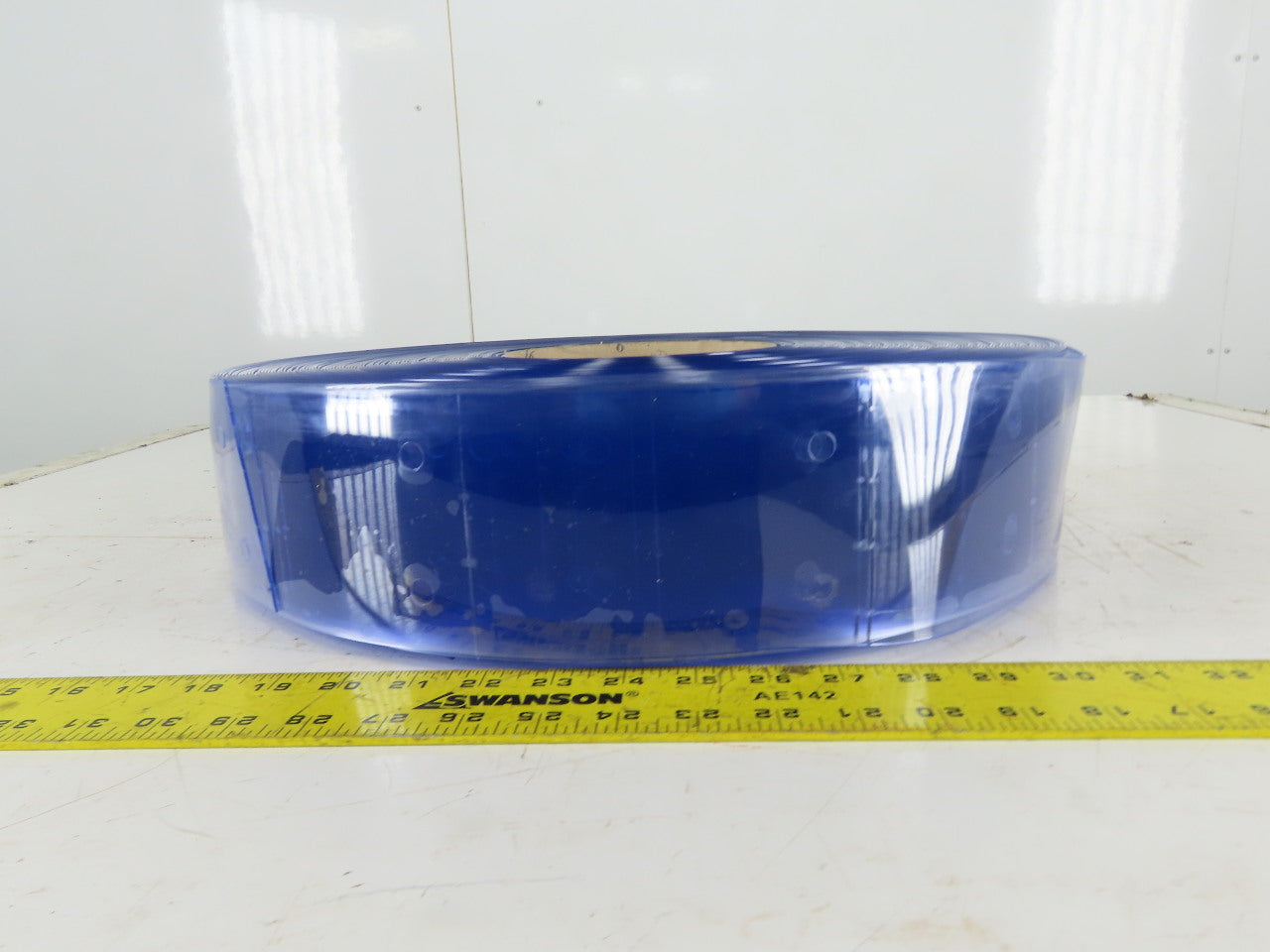 Quick Strip 4" x .060" x 300' Standard Smooth 34" Precut Prepunched Strip Door