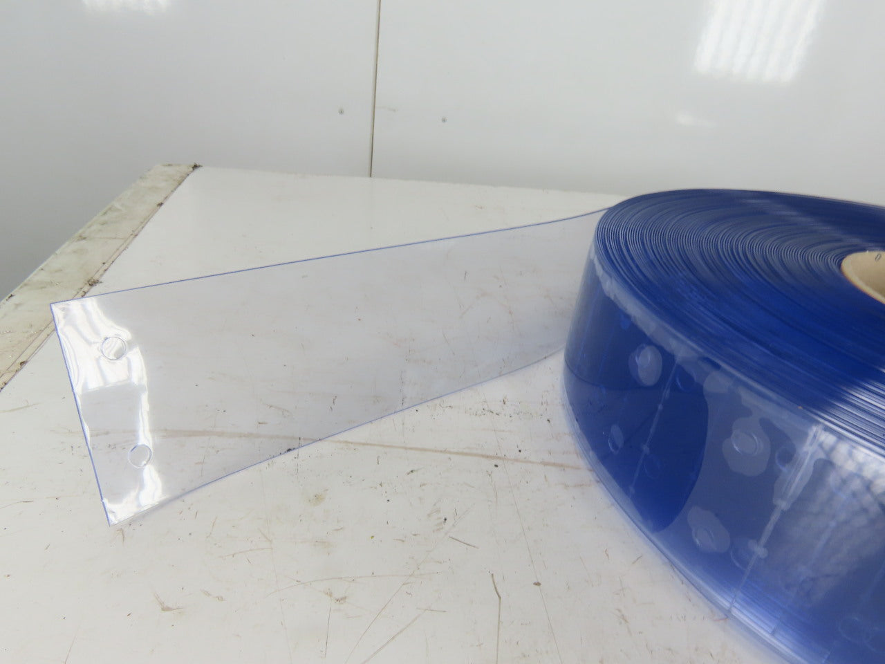 Quick Strip 4" x .060" x 300' Standard Smooth 34" Precut Prepunched Strip Door