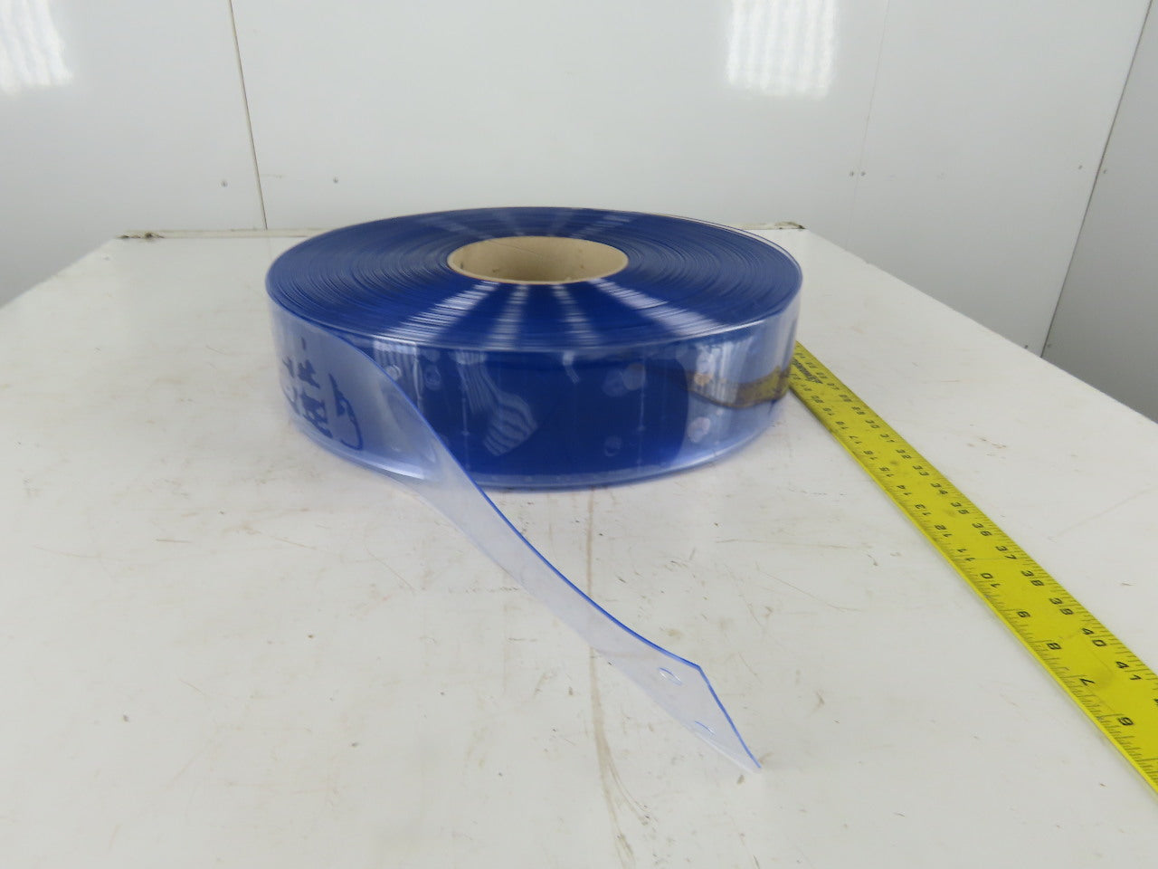 Quick Strip 4" x .060" x 300' Standard Smooth 34" Precut Prepunched Strip Door