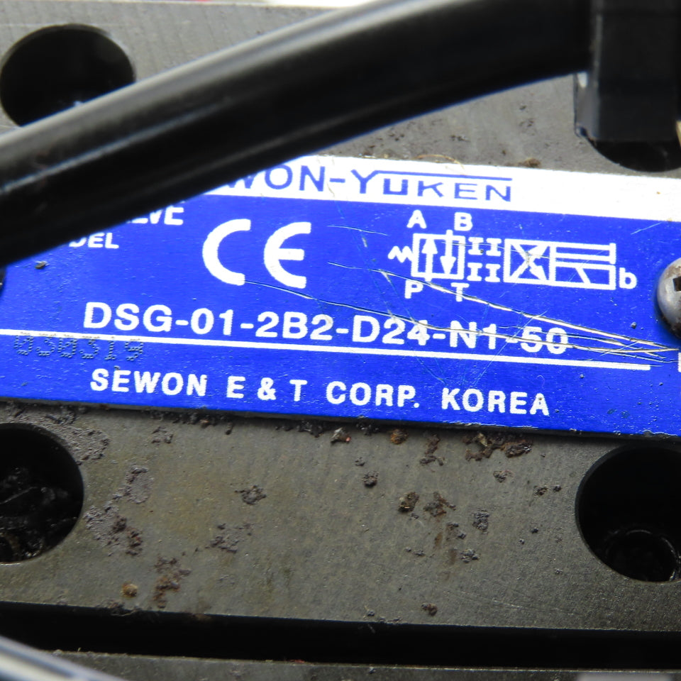 Yuken DSG-01-2B2-D24-N1-50 3 Way Hydraulic Directional Valve Manifold Assembly