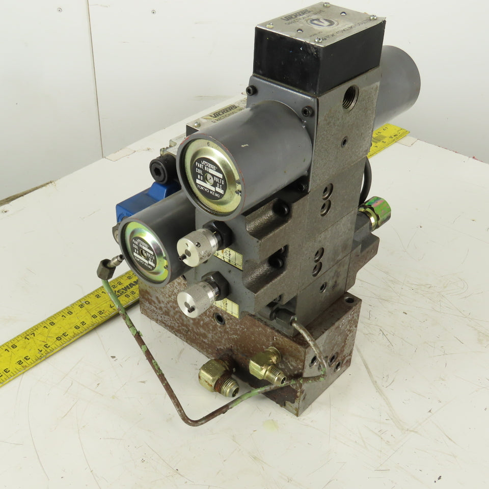 Vickers DG4L-3-6C-PL2-H-11 3 Way Float Center Metered Check Valve Manifold 24VDC
