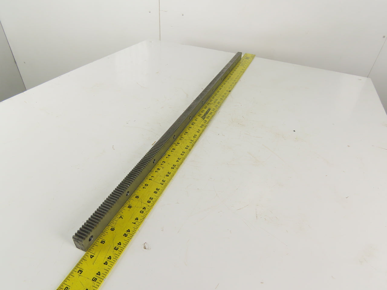 Gudel 0104971 1030mm X-Axis Rack Gear From a Bystronic Bystar 3015 Laser