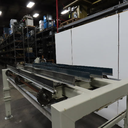 System TM AS Automated Feeding/Unloading System Conveyor 111-1/2" Paddles 125FPM