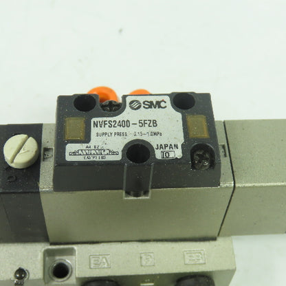 SMC NVFS2400-5FZB Solenoid Valve 1.0MPa 21-26VDC Coil W/ Manifold Block