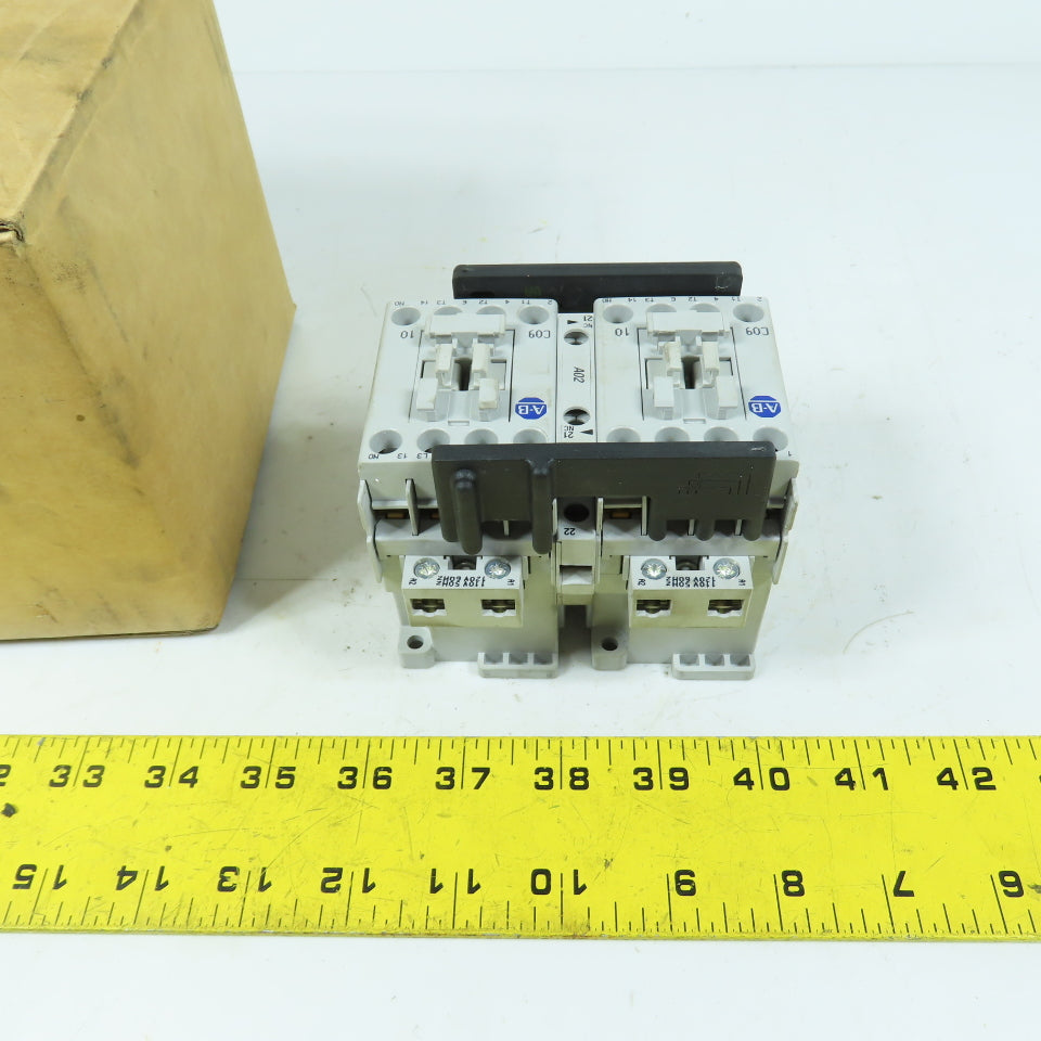 Allen-Bradley 104-C09D22 9A IEC Reversing Contactor 120V Coil 3-Pole Series B