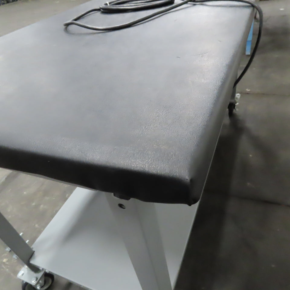 Uline 30" x 60" Padded Top Rolling Packing Table 36" Tall