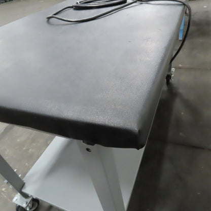 Uline 30" x 60" Padded Top Rolling Packing Table 36" Tall
